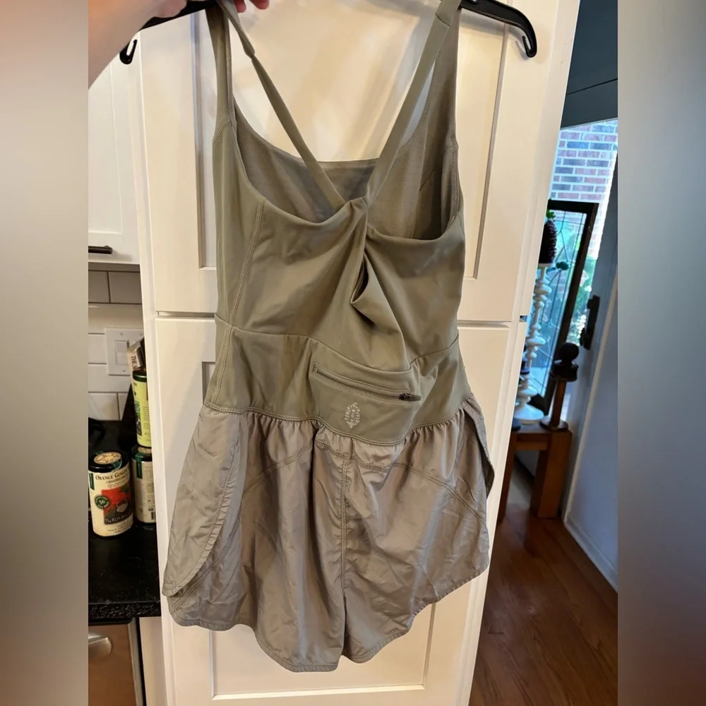 new Free People righteous runsie active romper in sage stone green
